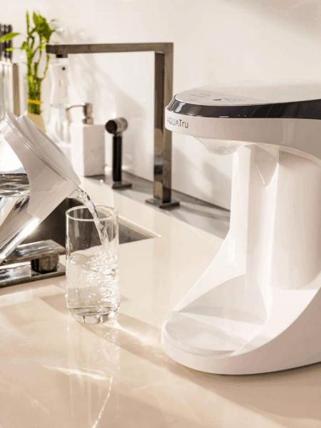AquaTru Reverse Osmosis Carafe on a kitchen counter.