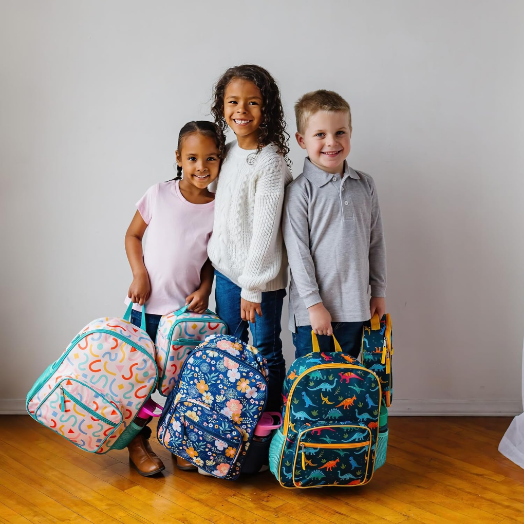 Three children with eco-friendly backpacks for school