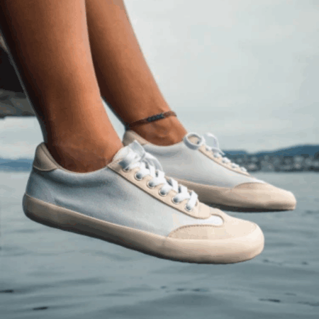 a pair of feet in white best barefoot shoes