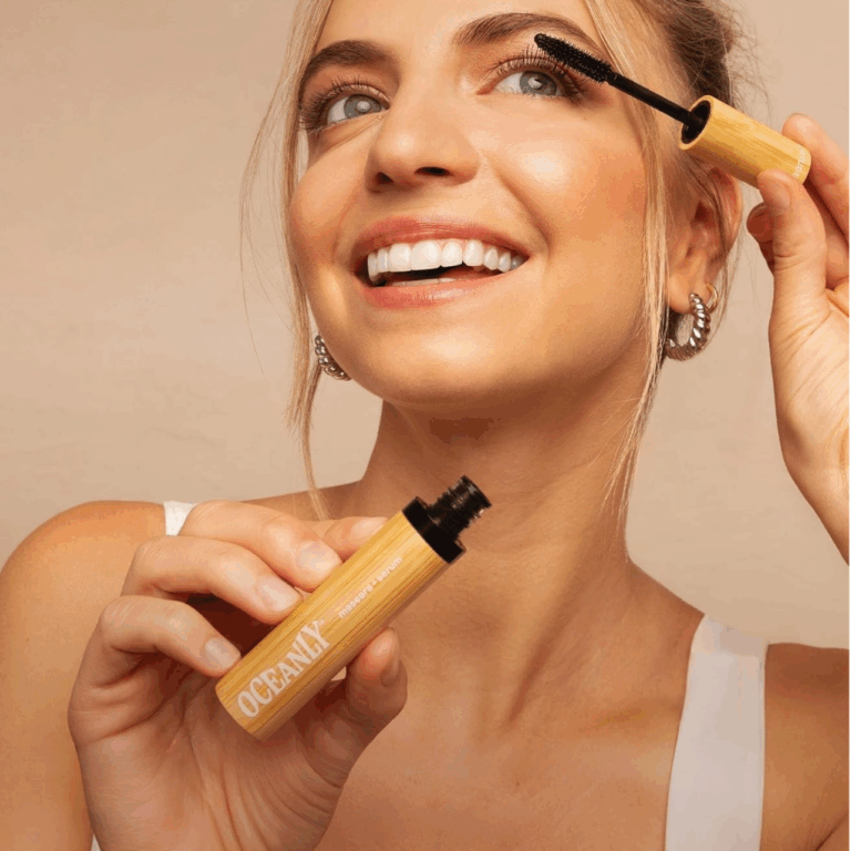 Girl putting on mascara
