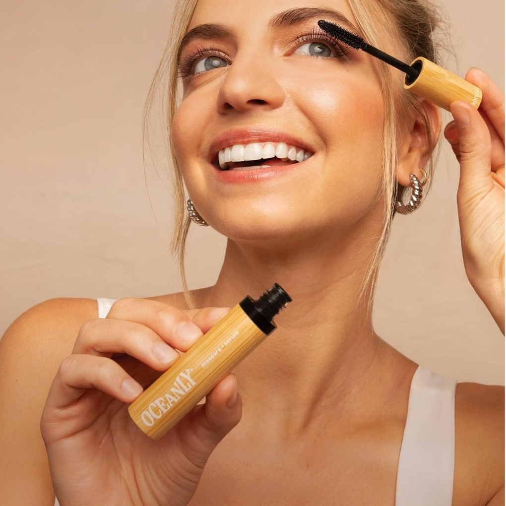 Girl putting on mascara