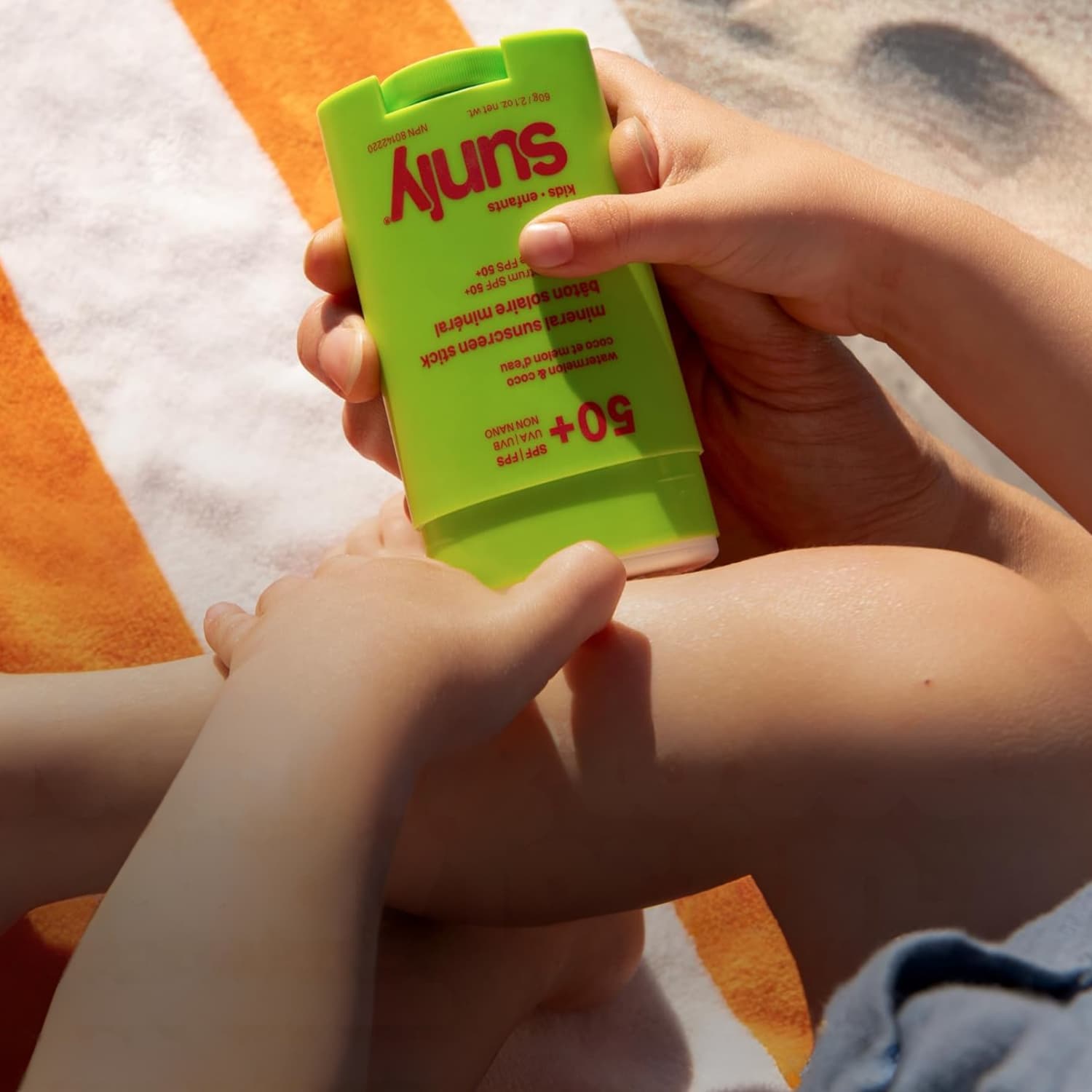 ATTITUDE Sunly SPF 50 mineral sunscreen stick in a cardboard tube on cream linen, plastic-free sunscreen for kids