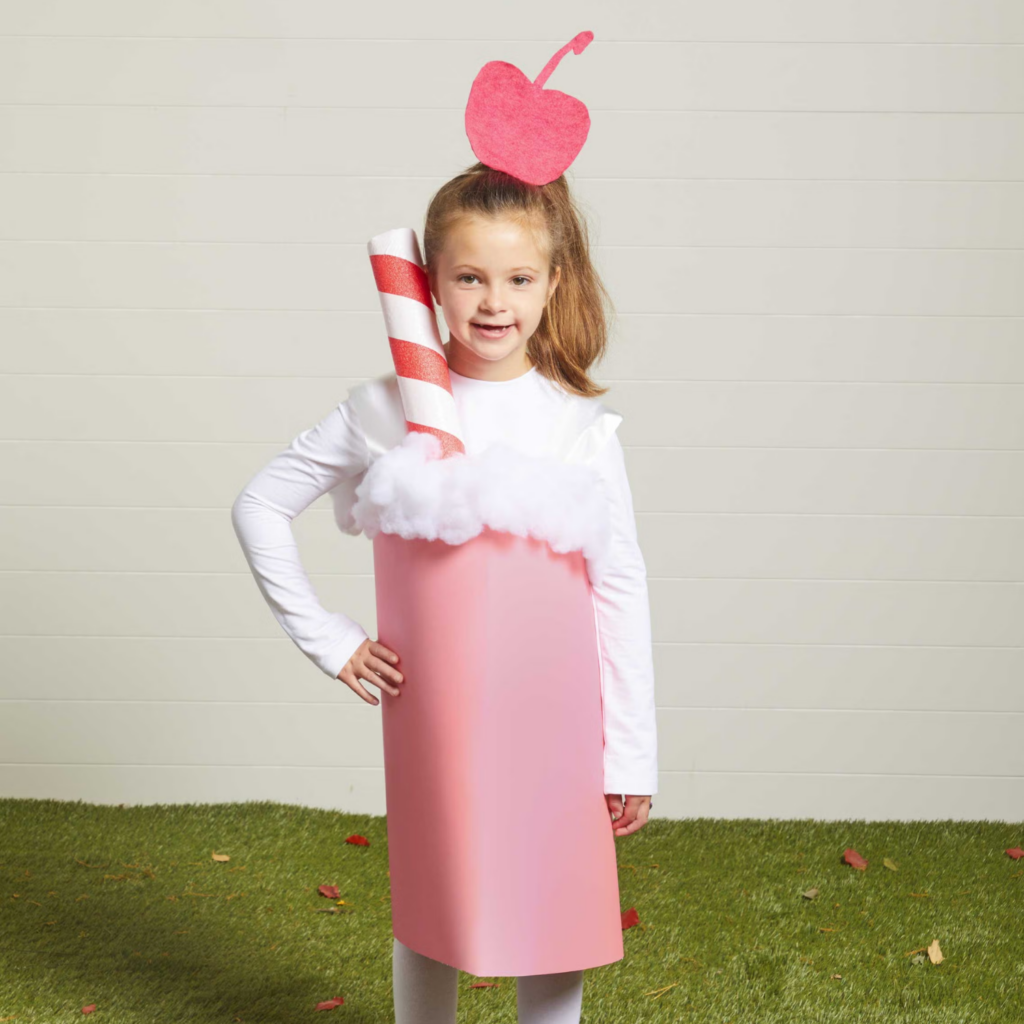 Girl in a pink DIY milkshake Halloween costume
