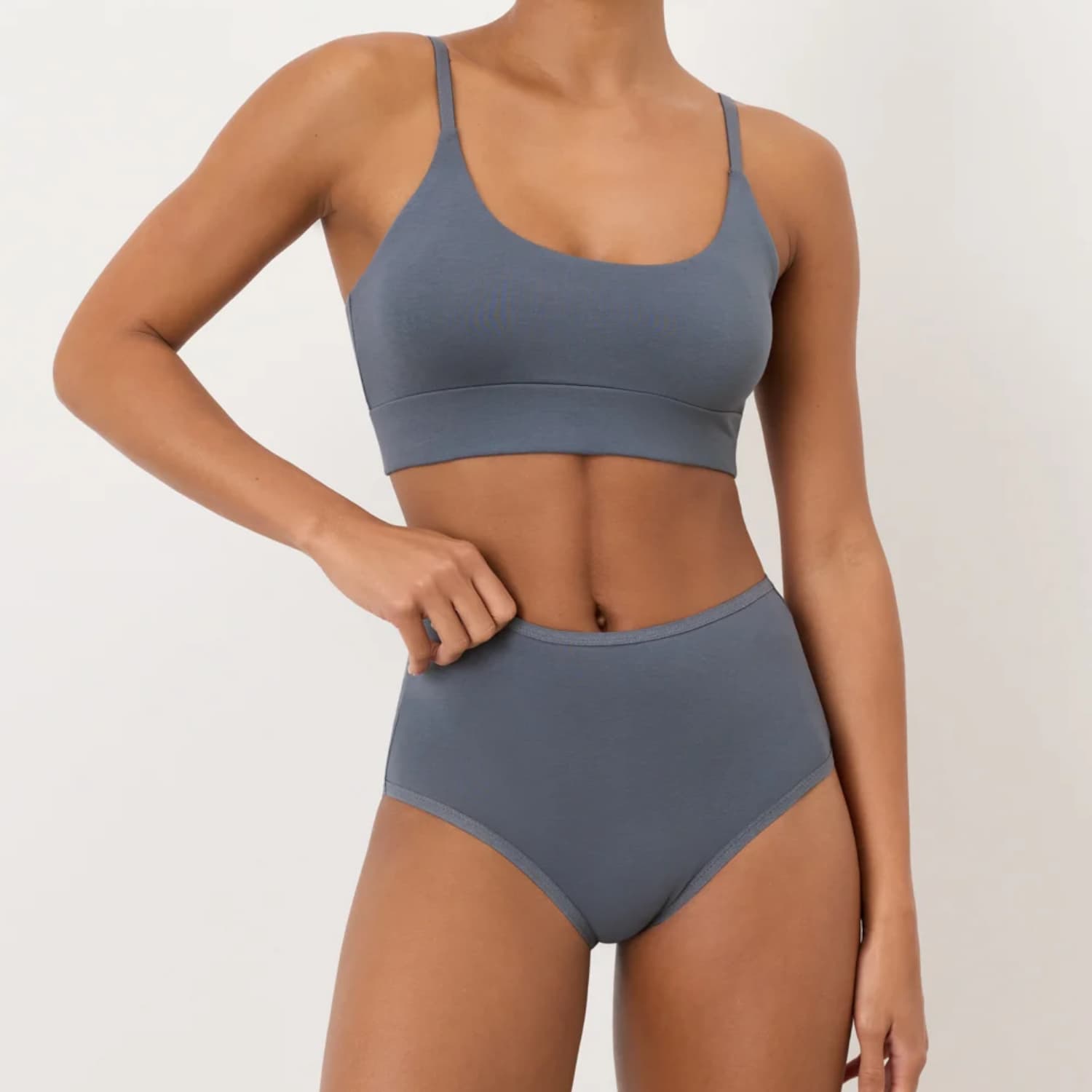 Pact Everyday High Rise Brief in slate blue worn with a matching scoop neck bralette
