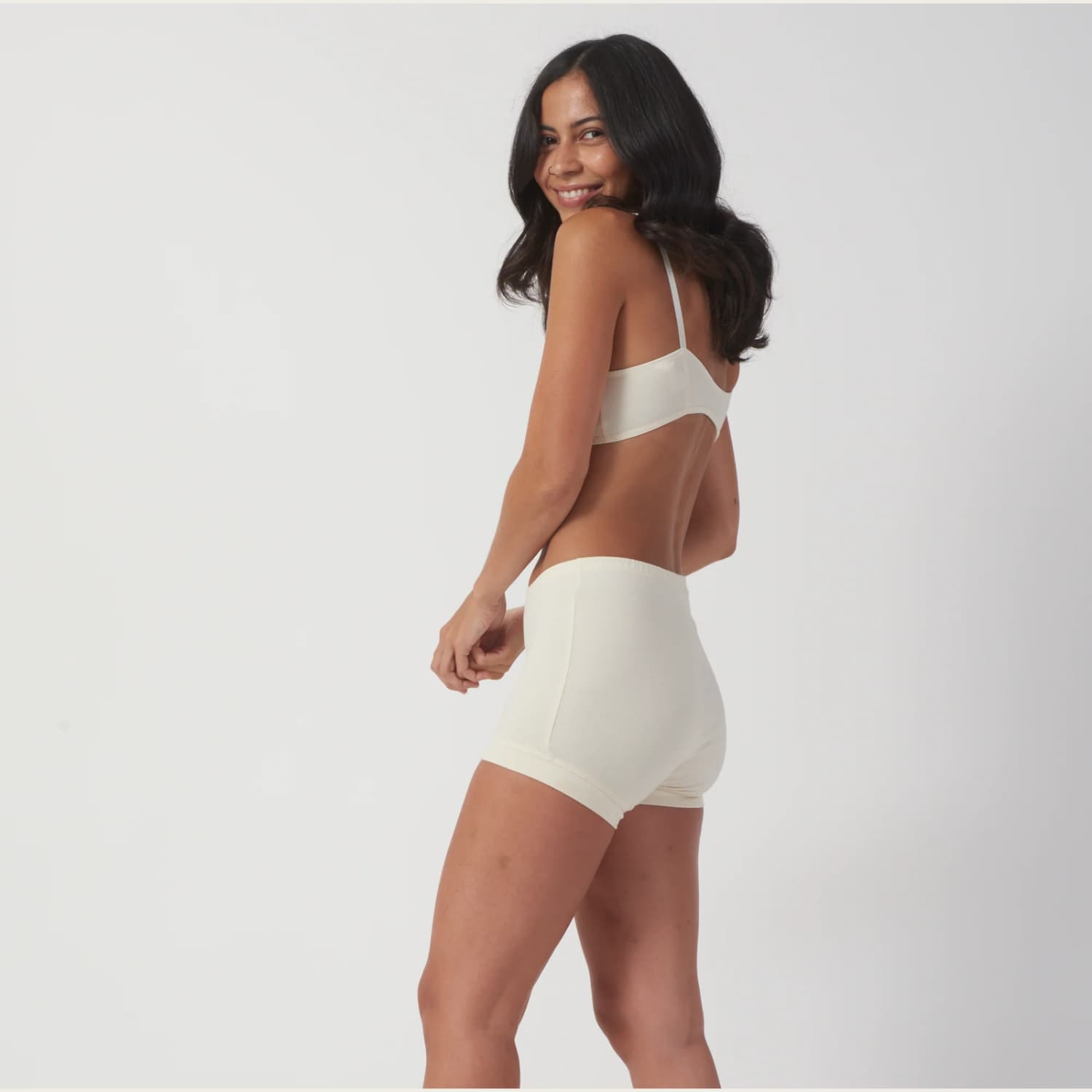 Brook There Undyed Boyshort in natural cream organic cotton worn with a matching bralette
