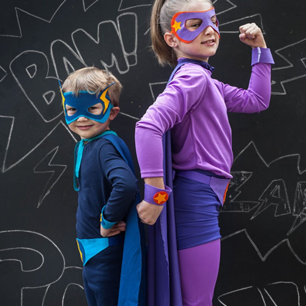 Kids in no-sew felt superhero capes and masks