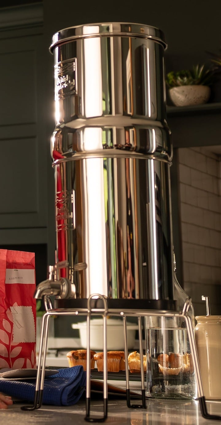British Berkefeld stainless steel gravity water filter on a kitchen counter